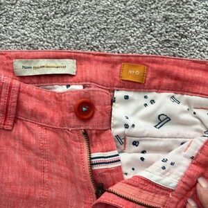 Pilcro coral pants with teal side leg stitching